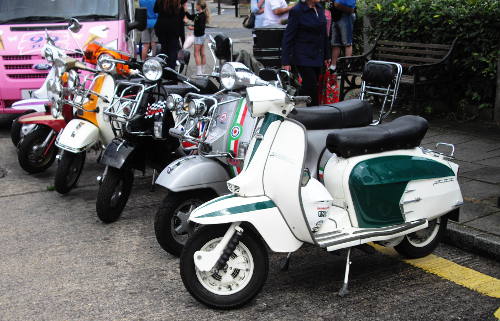 five motor scooters